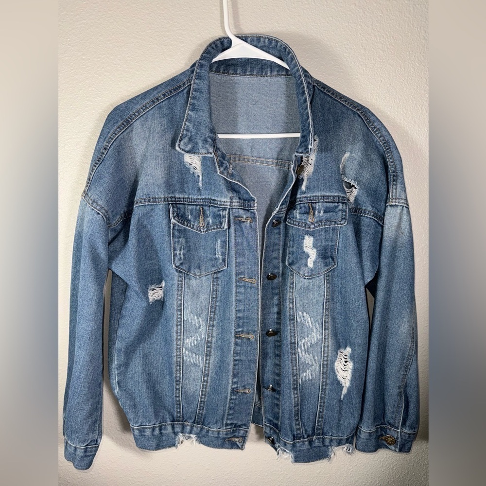 Distressed, women’s medium blue Jean jacket
